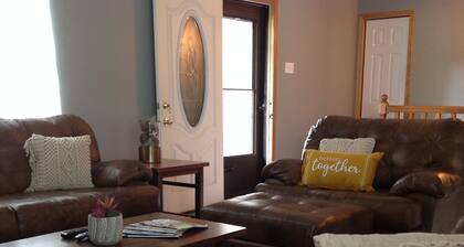 Lake of Egypt 4 bedroom home sleeps 8 with dock and flat yard and lakefront!