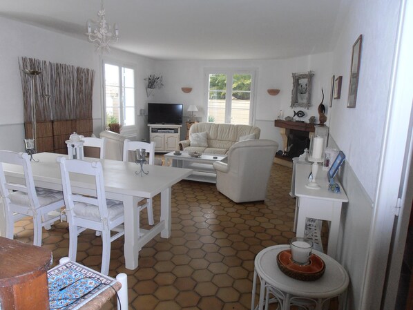 Flat-screen TV, DVD player, table football, ping pong