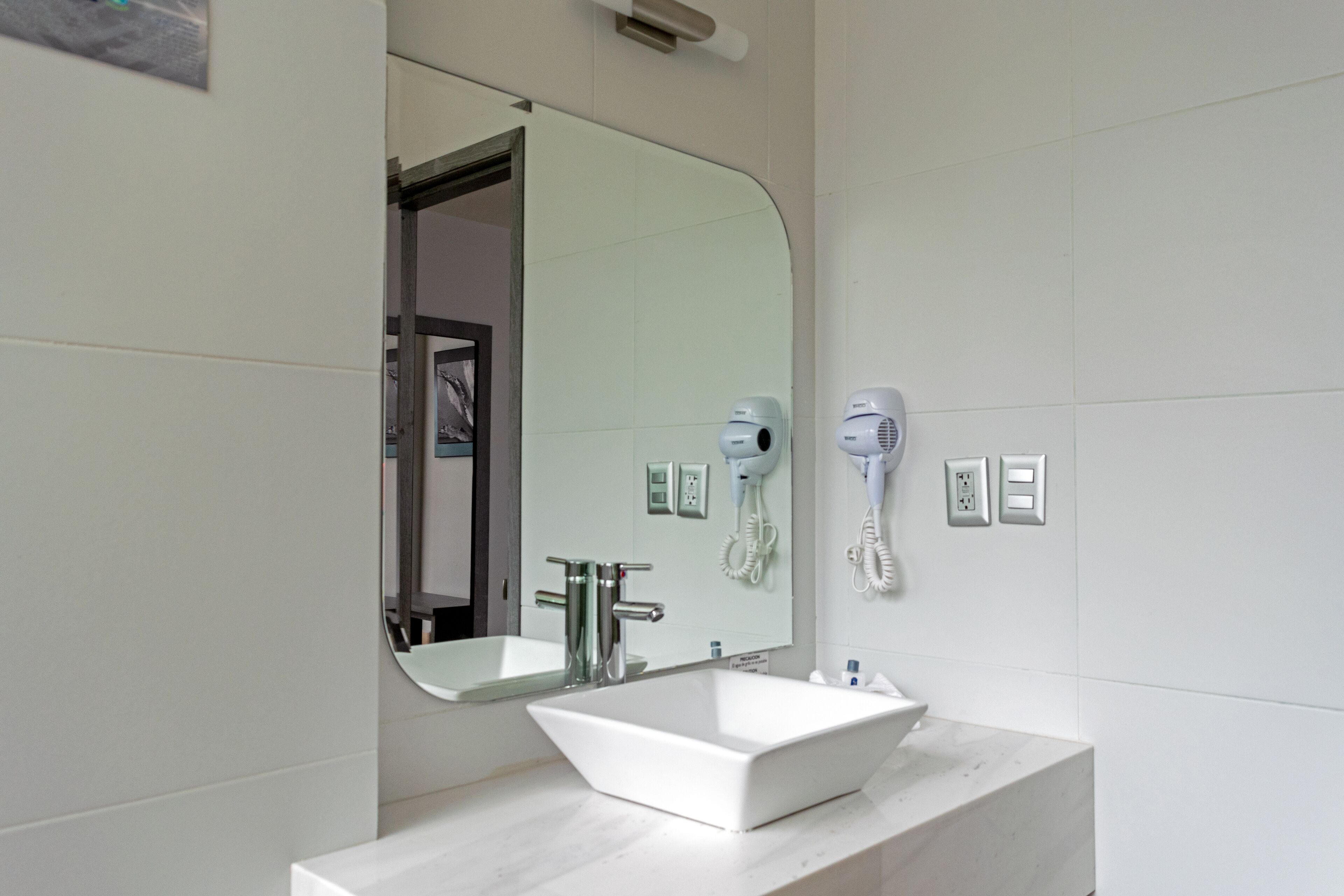 deluxe room, 1 king bed | bathroom | shower, rainfall showerhead, free toiletries, hair dryer