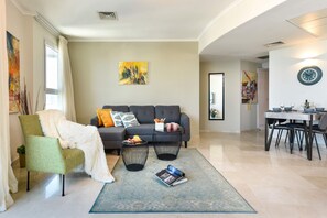 Apartment, Non Smoking, Pool Access | Living area | 48-inch LCD TV with satellite channels, TV - Beautiful w Balcony & Panoramic Sea View (Tel Aviv)