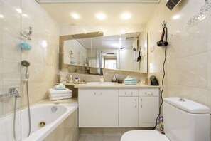 Apartment, Pool Access, Oceanfront | Bathroom | Combined shower/tub, deep soaking tub, hair dryer, towels
