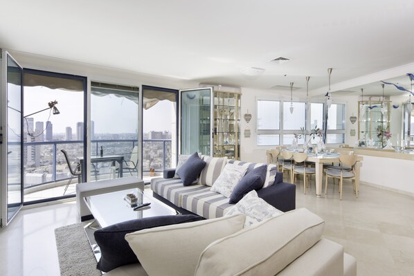 Apartment, Pool Access, Oceanfront | Living area | LCD TV