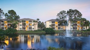 Surrounded by lush greenery and a serene water feature, this hotel offers stunning views and a tranquil atmosphere.