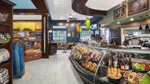 Freshly baked goods and artisanal cheeses on display in our bakery and deli.