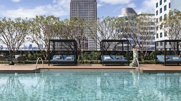 Outdoor pool, open 7:00 AM to 9:00 PM, free pool cabanas, pool umbrellas
