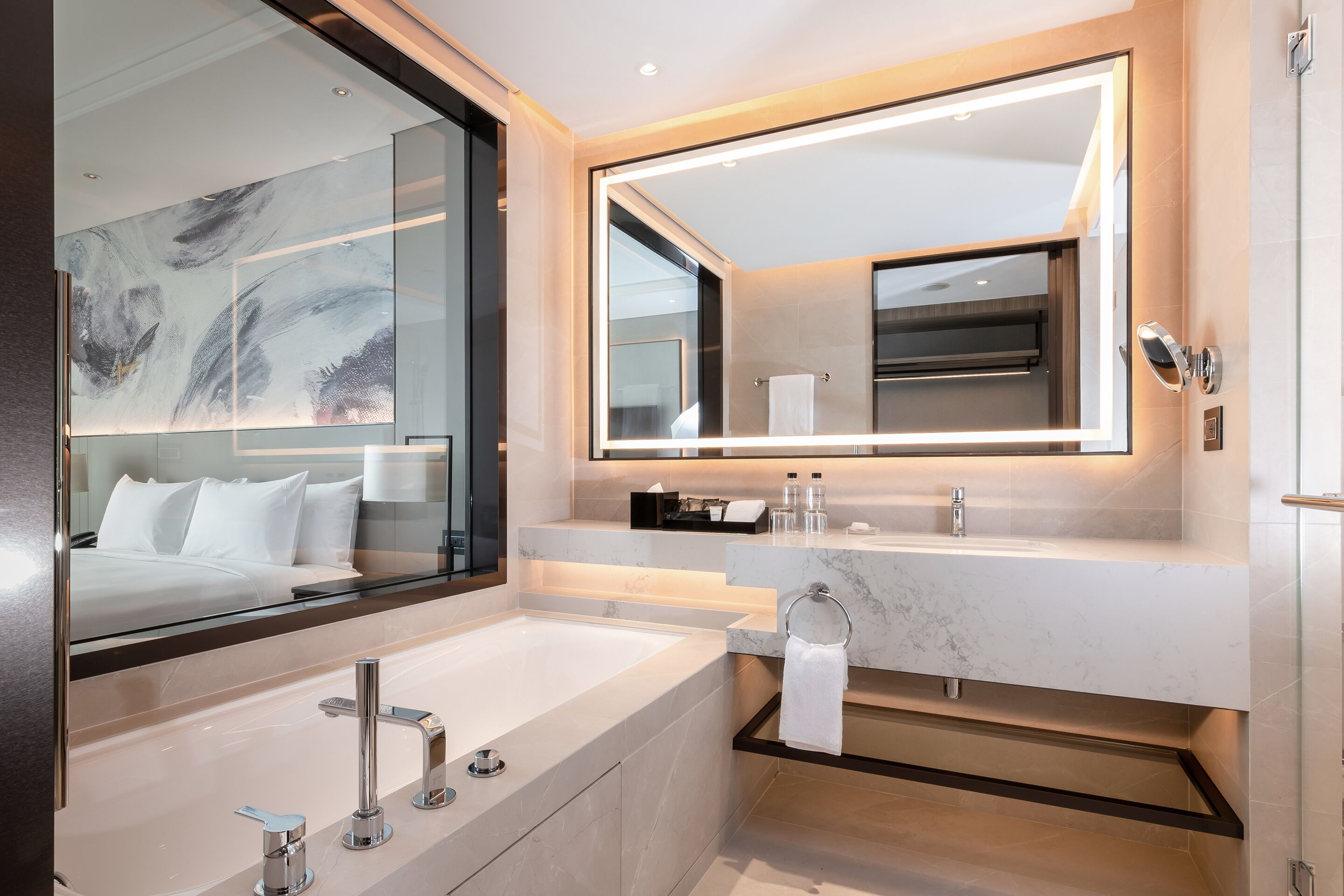 deluxe room | bathroom | separate bathtub and shower, deep-soaking bathtub, rainfall showerhead