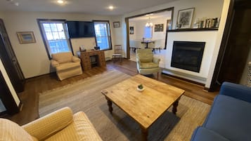 Smart TV, fireplace, books