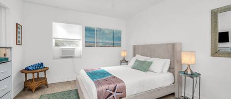 1 bedroom, desk, iron/ironing board, travel crib