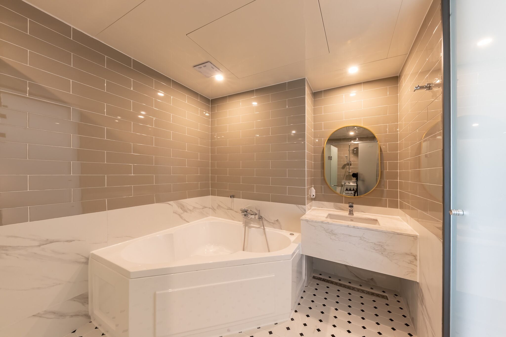 deluxe twin room | bathroom | separate bathtub and shower, deep-soaking bathtub, rainfall showerhead