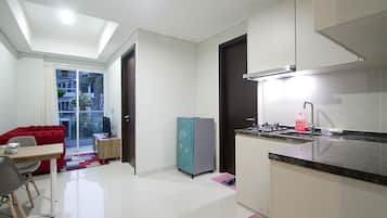 Apartment, 1 Bedroom | Living area | Flat-screen TV