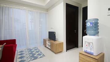 Apartemen, 2 kamar tidur | Ruang keluarga | TV layar datar