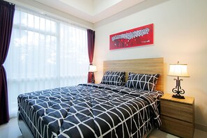 Apartment, 2 Bedrooms | Blackout drapes, bed sheets