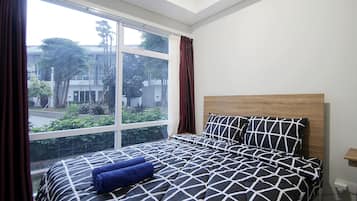 Apartemen, 1 kamar tidur | Tirai kedap cahaya dan seprai linen