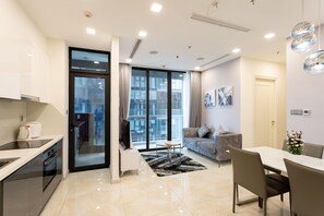 Apartment, 2 Bedrooms | Living area | 41-inch Smart TV with cable channels, TV