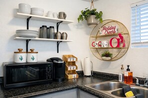 Fridge, microwave, oven, stovetop - Green Door Cottage | Charming Coastal Getaway (San Diego)