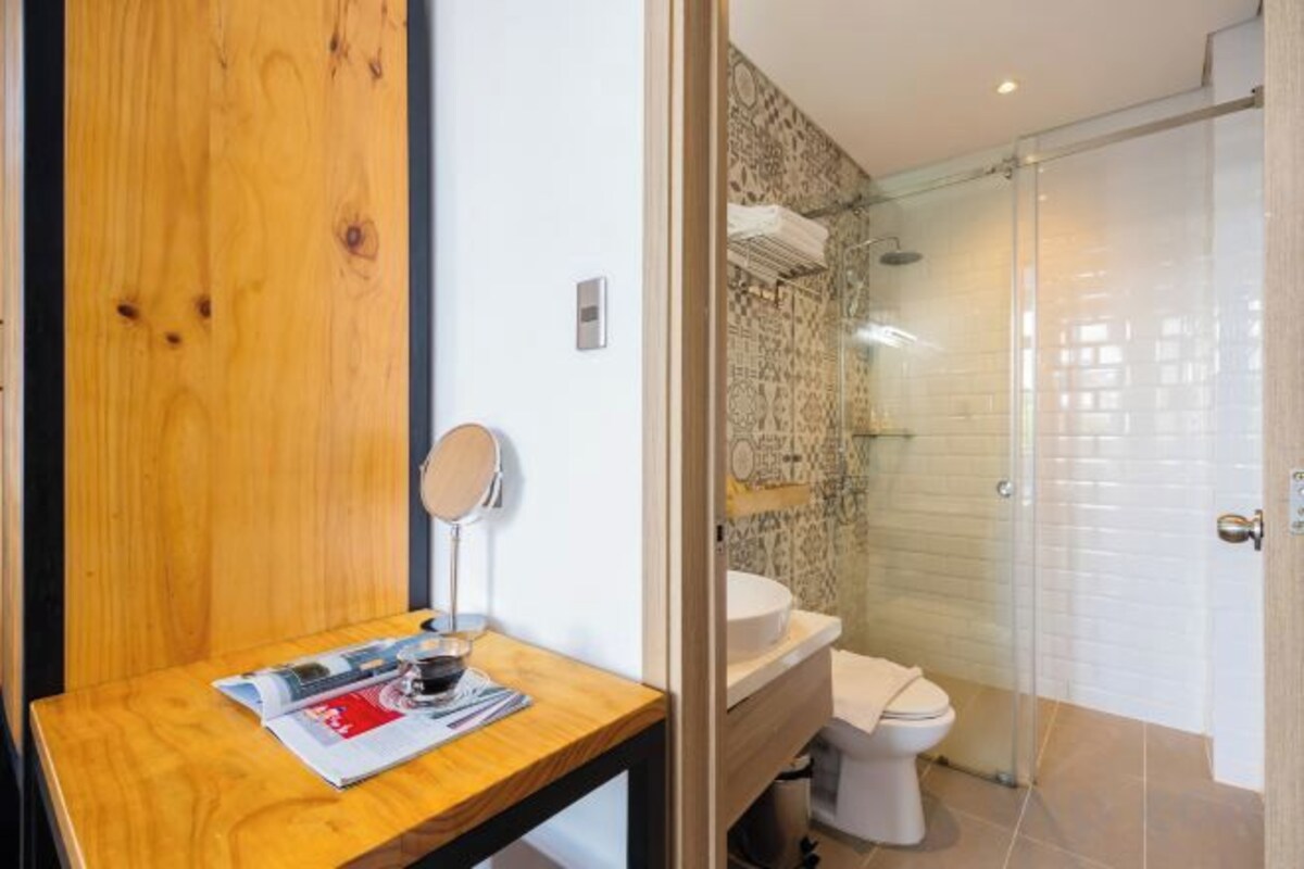 Bathroom | Separate tub and shower, rainfall showerhead, designer toiletries