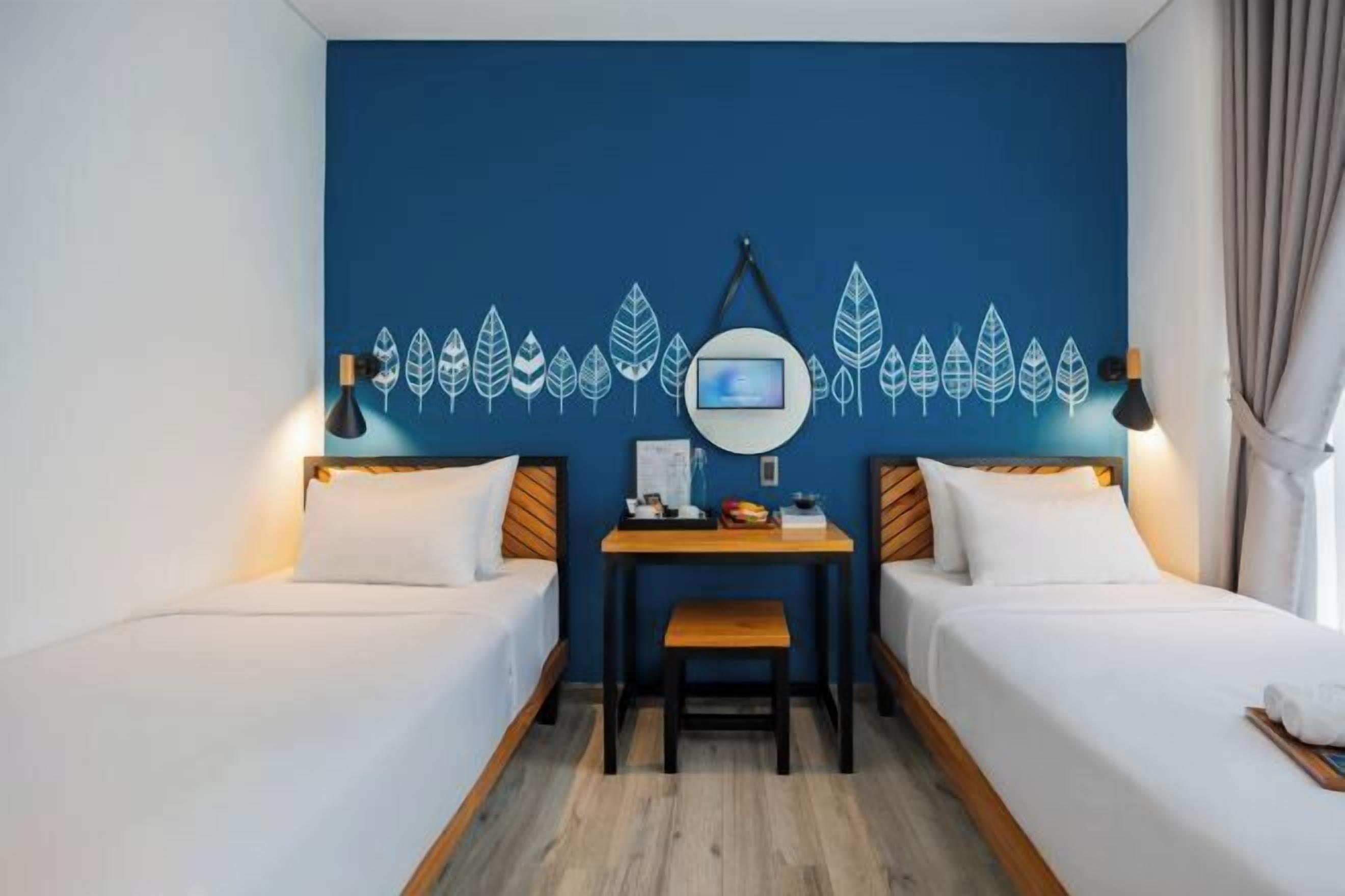 Premium bedding, individually furnished, desk, blackout drapes