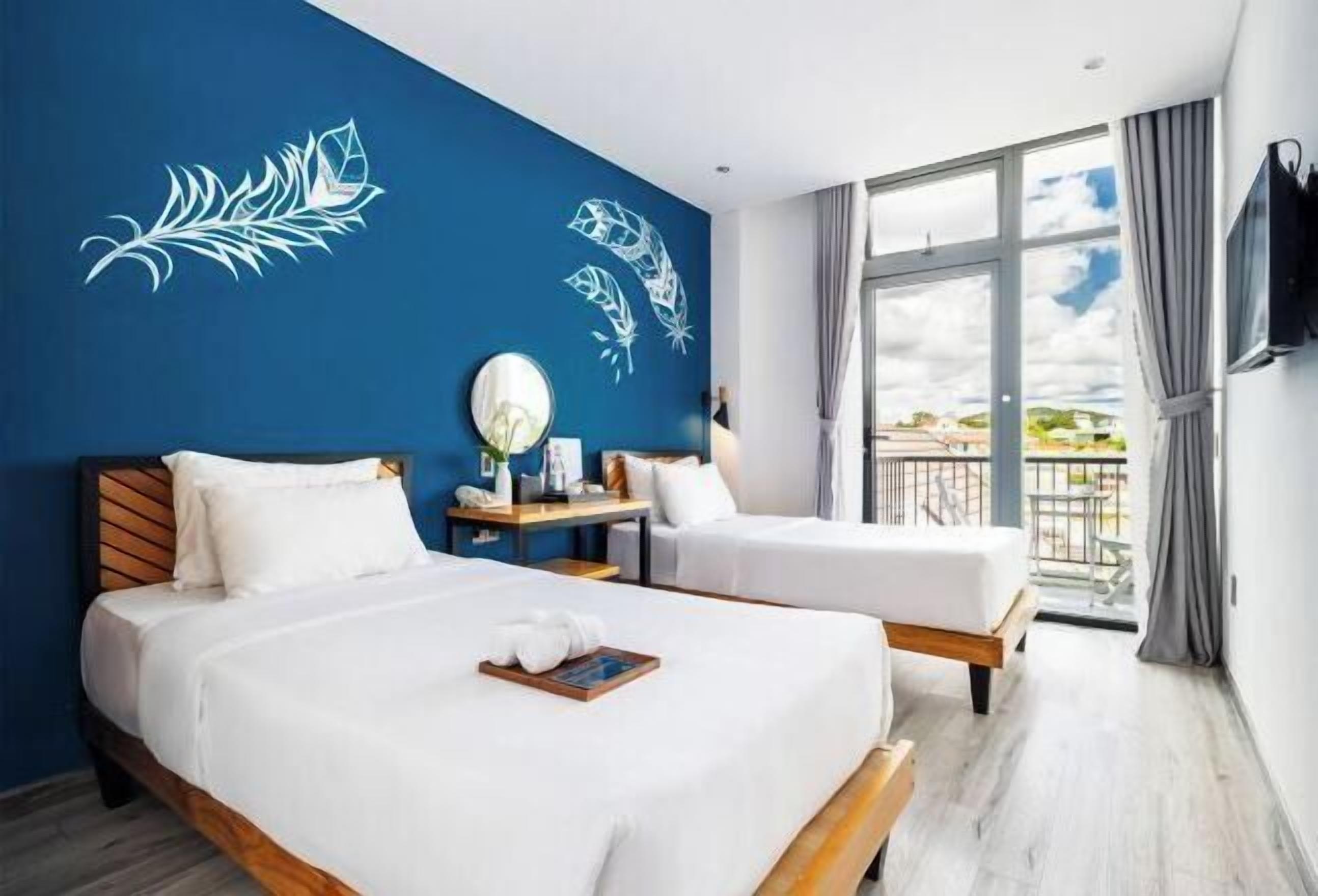 Premium bedding, individually furnished, desk, blackout drapes