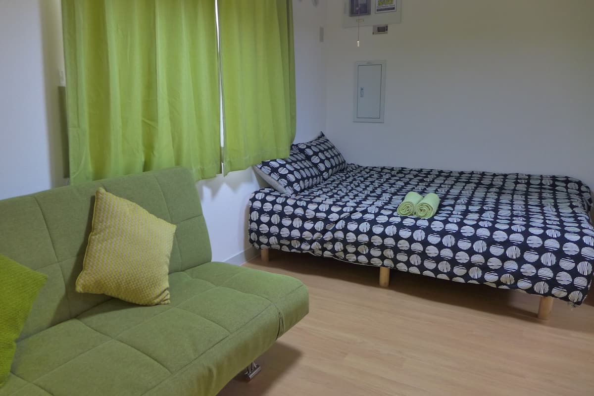 Apartment, 2 Schlafzimmer (4F) | 3 Schlafzimmer, Verdunkelungsvorhänge, kostenloses WLAN, Bettwäsche