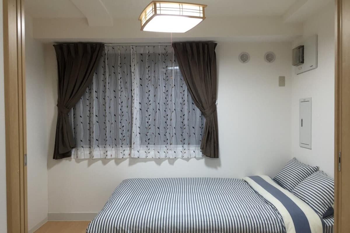 Apartment, 3 Schlafzimmer, 2 Bäder (3F) | 3 Schlafzimmer, Verdunkelungsvorhänge, kostenloses WLAN, Bettwäsche