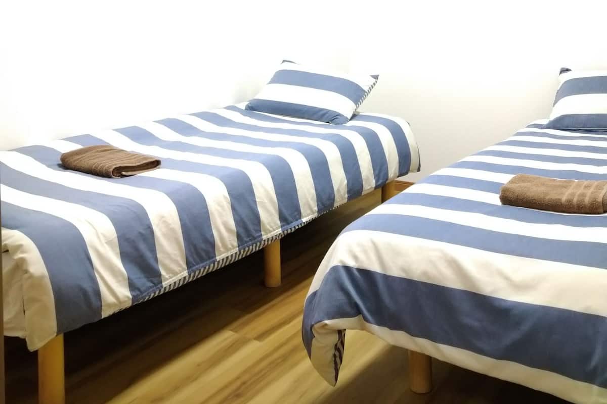 Apartment, 3 Schlafzimmer, 2 Bäder (1F) | 3 Schlafzimmer, Verdunkelungsvorhänge, kostenloses WLAN