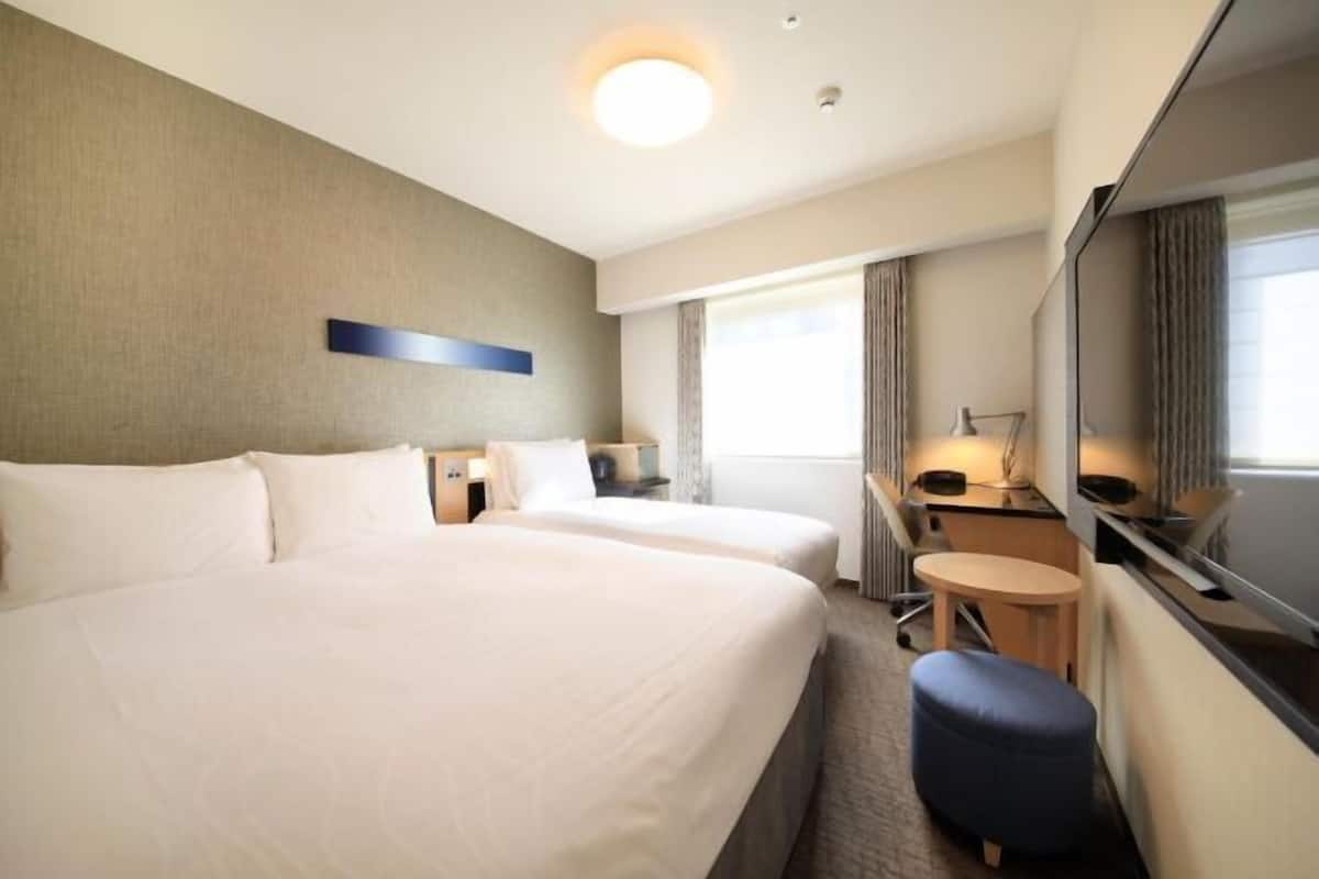 Desk, laptop workspace, free WiFi, bed sheets