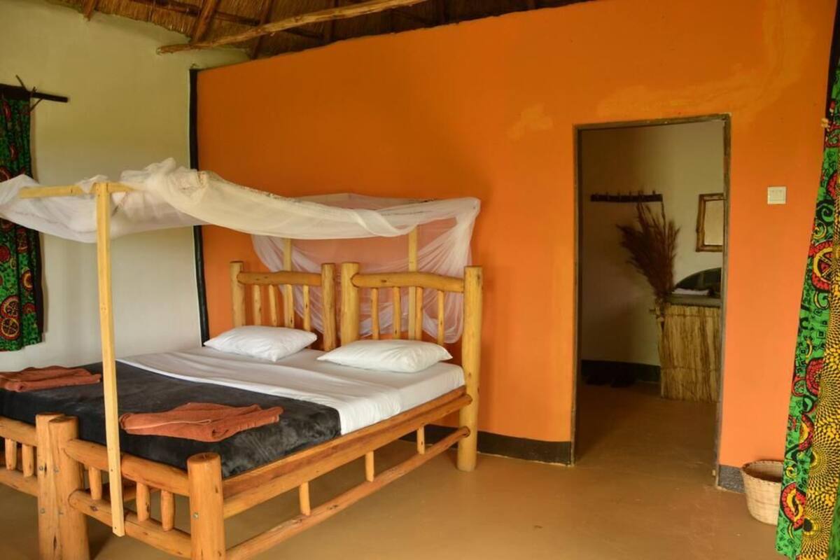 Premium bedding, desk, laptop workspace, blackout drapes