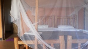 Triple Room | Premium bedding, individually decorated, desk, laptop workspace - Twiga Tales Safari (Pakwach)