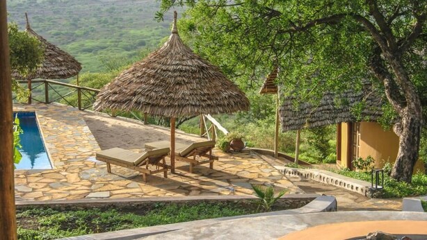 2 outdoor pools, pool umbrellas, pool loungers