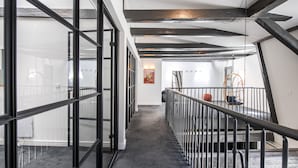 A modern interior with a staircase, glass partitions, and a minimalist design. - The Churchill Penthouse by Daniel&Jacob’s (Copenhagen)