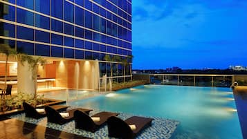 Outdoor pool, open 7:00 AM to 9:00 PM, free cabanas, pool umbrellas