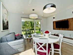 Apartment, 1 Bedroom, Terrace (C3) | Living area | Flat-screen TV - BlueApart Apartamenty Na Klifie (Wladyslawowo)