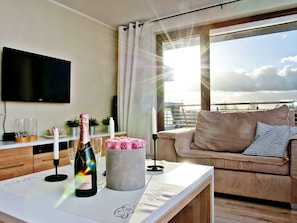 Apartment, 1 Bedroom, Balcony (A39) | Living area | Flat-screen TV - BlueApart Apartamenty Na Klifie (Wladyslawowo)