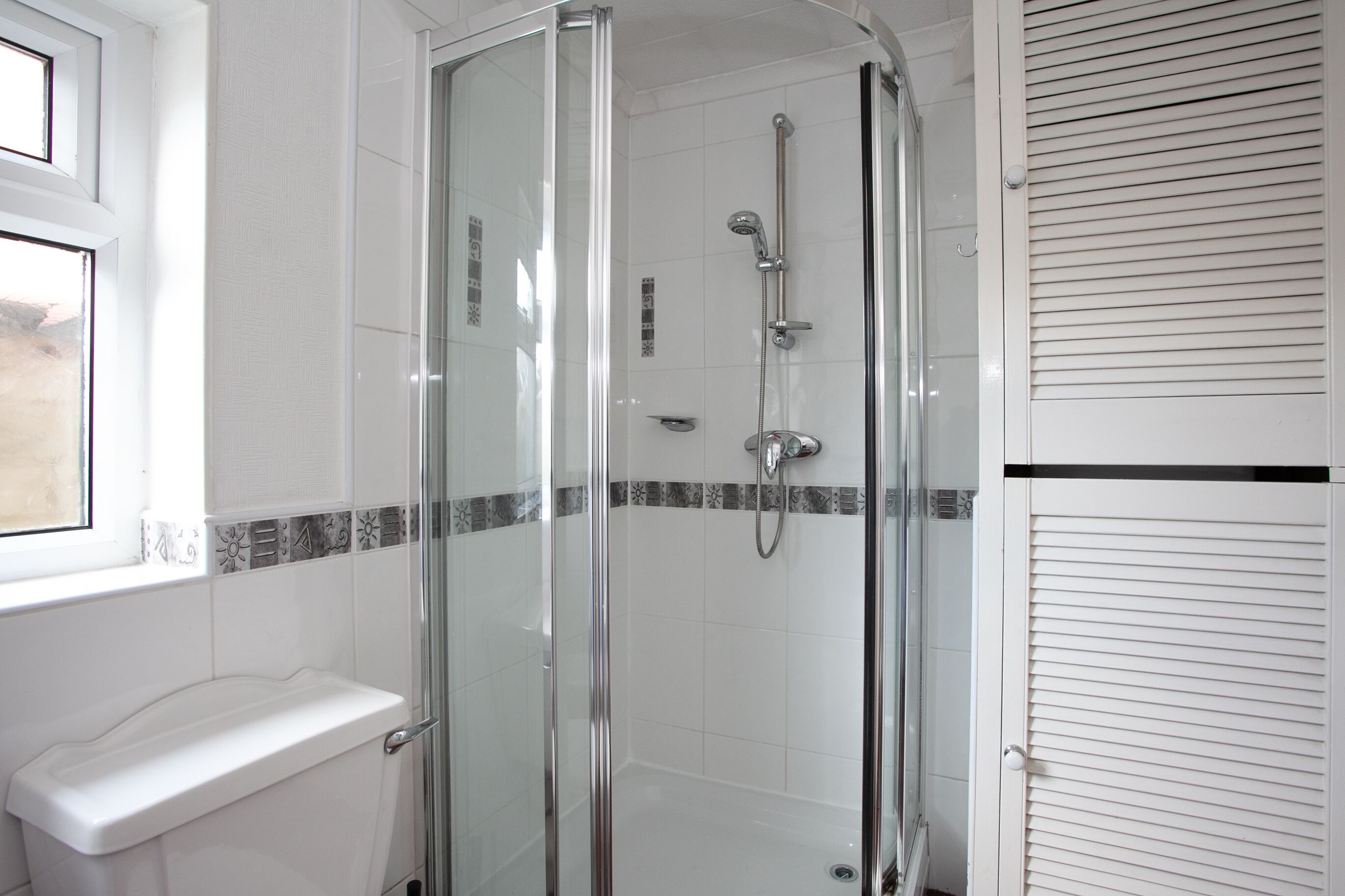 Bathtub, hair dryer, towels, soap