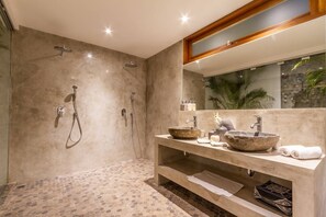 Bathtub, hair dryer, towels, soap