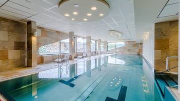Indoor pool, open 7:00 AM to 9:00 PM, sun loungers