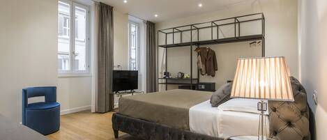 1 chambre, coffres-forts dans les chambres, fer et planche à repasser