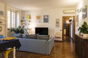 Superior Apartment, 2 Bedrooms | Living area | 32-inch flat-screen TV with digital channels, TV, fireplace - notaMi -  Casagrande 1920 (Milan)