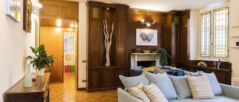 Superior Apartment, 2 Bedrooms | Living area | 32-inch flat-screen TV with digital channels, TV, fireplace