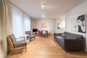 30-tums platt-tv med satellitkanaler och tv