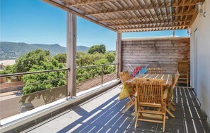 Outdoor dining - Duplex with terraces, 500m from the beach, sea view in residence with swimming pool (Pinarellu)