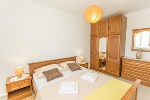2 habitaciones, tabla de planchar con plancha, internet y ropa de cama 