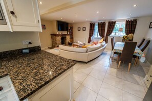 TV, fireplace, books, stereo