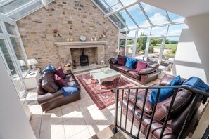 TV, fireplace, books, stereo