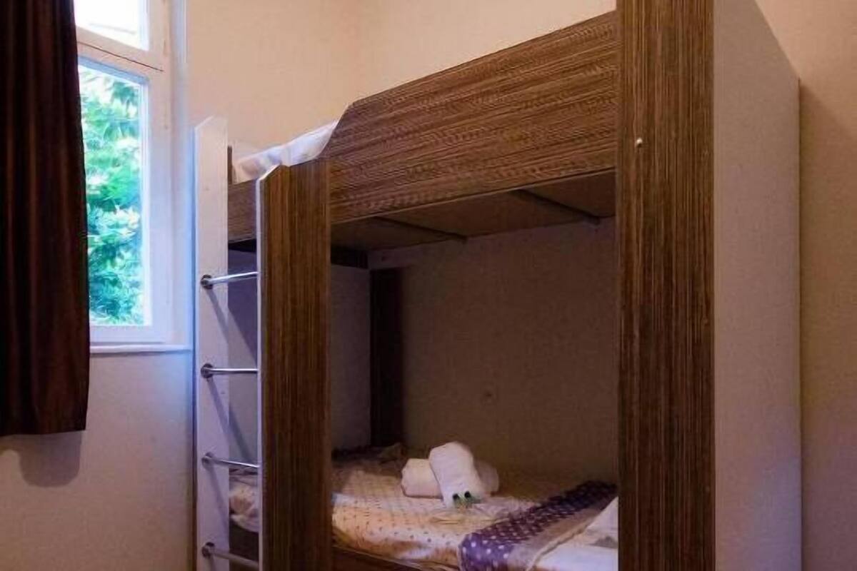 Blackout curtains, soundproofing, iron/ironing board (on request)