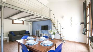 Apartment, 1 Bedroom | Living area | TV