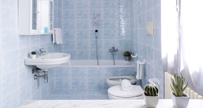 Apartment, Balcony (1 Bedroom) | Bathroom | Rainfall showerhead, hair dryer, bidet, towels