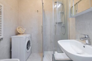 Apartment, 1 Bedroom, City View | Bathroom | Shower, hair dryer, bidet, towels - JOIVY Apartment, Window to the Vertical Forest (Milan)