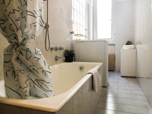 Apartment, 1 Bedroom | Bathroom | Combined shower/tub, rainfall showerhead, hair dryer, bidet - JOIVY Wooden Guerrini Apartment (Milan)