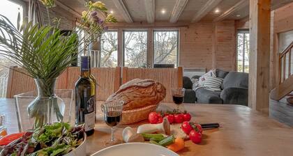 traumHaff® Lauschiges Küstenchalet ganz aus Lärchenholz mit Kamin & Sauna Ostsee